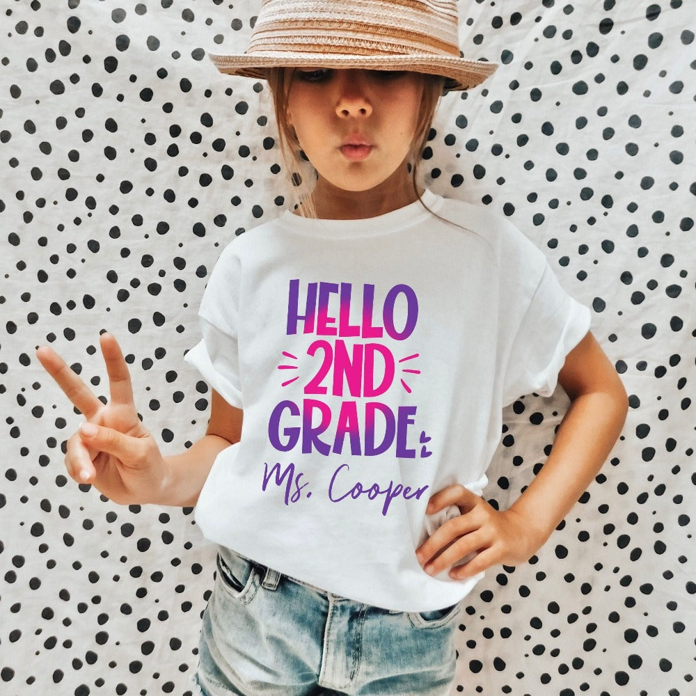 Hello 2nd Grade! Customize this retro vibrant new grade shirt as a thank you gift idea for teacher, trainer, instructor and homeschool mama. Create a custom look and show appreciation to your favorite grade teacher with this unique shirt. Perfect for elementary team spirit, back to school, last day of school, summer or spring break. Great outfit for everyday use both in and out of the classroom.