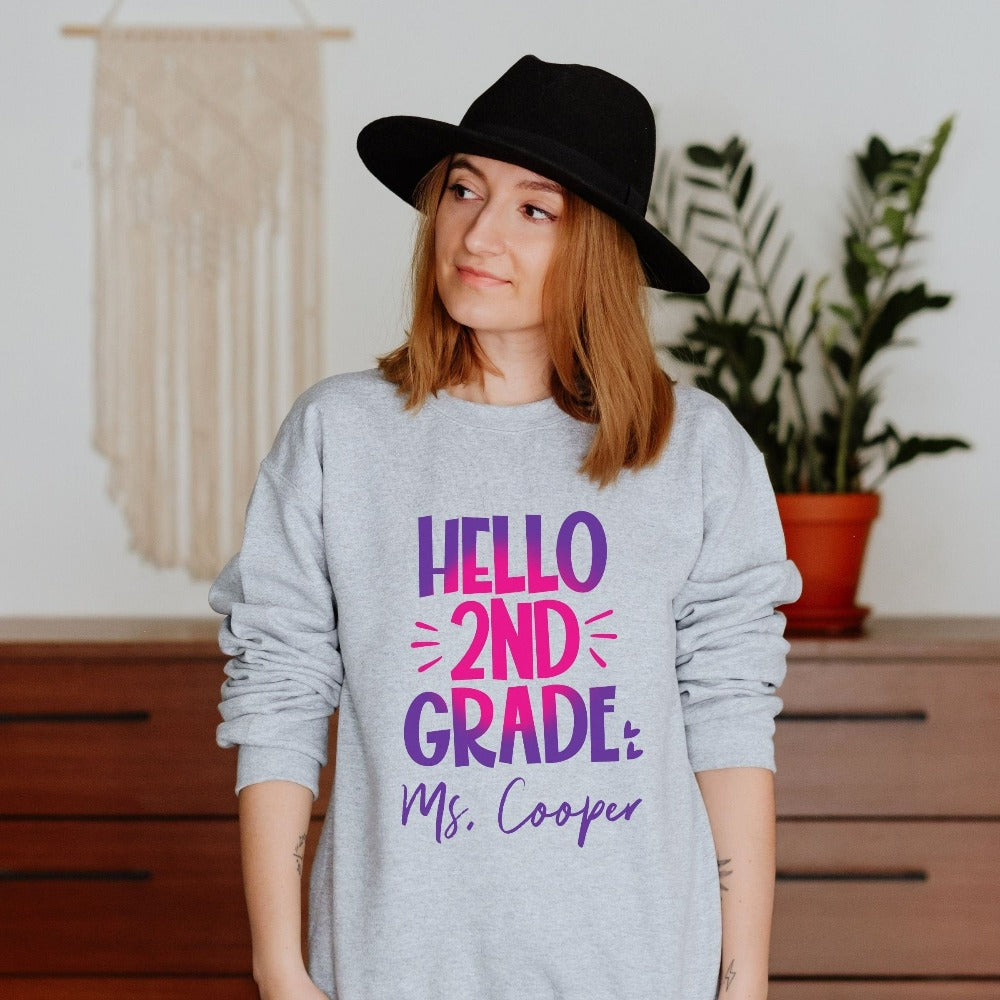 Hello 2nd Grade! Customize this retro vibrant new grade sweatshirt as a thank you gift idea for teacher, trainer, instructor and homeschool mama. Create a custom look and show appreciation to your favorite grade teacher with this unique shirt. Perfect for elementary team spirit, back to school, last day of school, summer or spring break. Great outfit for everyday use both in and out of the classroom.