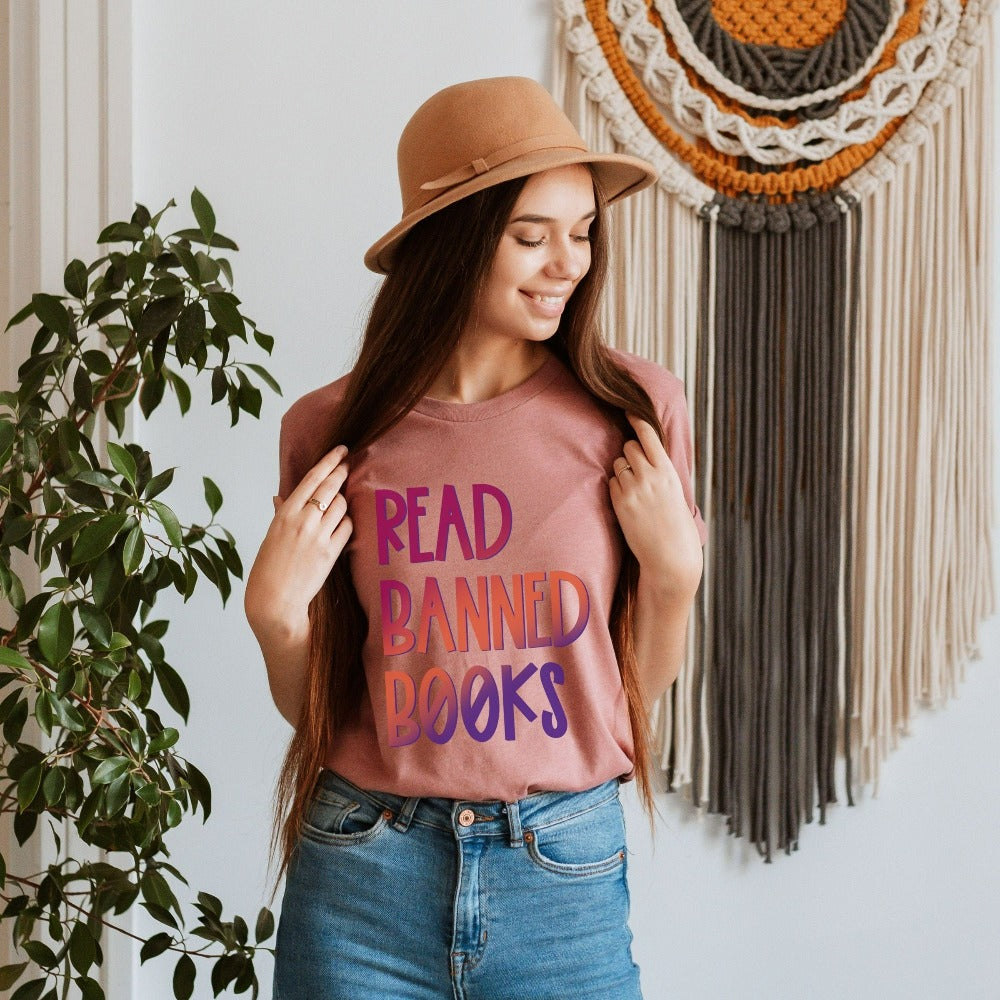 Funny book lover, English literature teacher, reading club or librarian gift idea. This Read Banned Books Humorous saying is a great expressive quote on a cute shirt. It always becomes the center of great conversation and a favorite for writers.