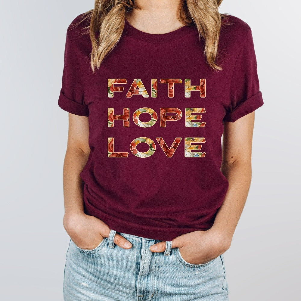 Positive Christian faith based gift idea shirt for religious friend or loved one. Bible verse and 1st Corinthians 13 quote - Faith, Hope and Love saying. Great matching floral casual graphic tee for a church convention, Sunday school or weekend service. Grab this for a birthday t-shirt outfit for a youth pastor or leader, minister or any other Christian family.