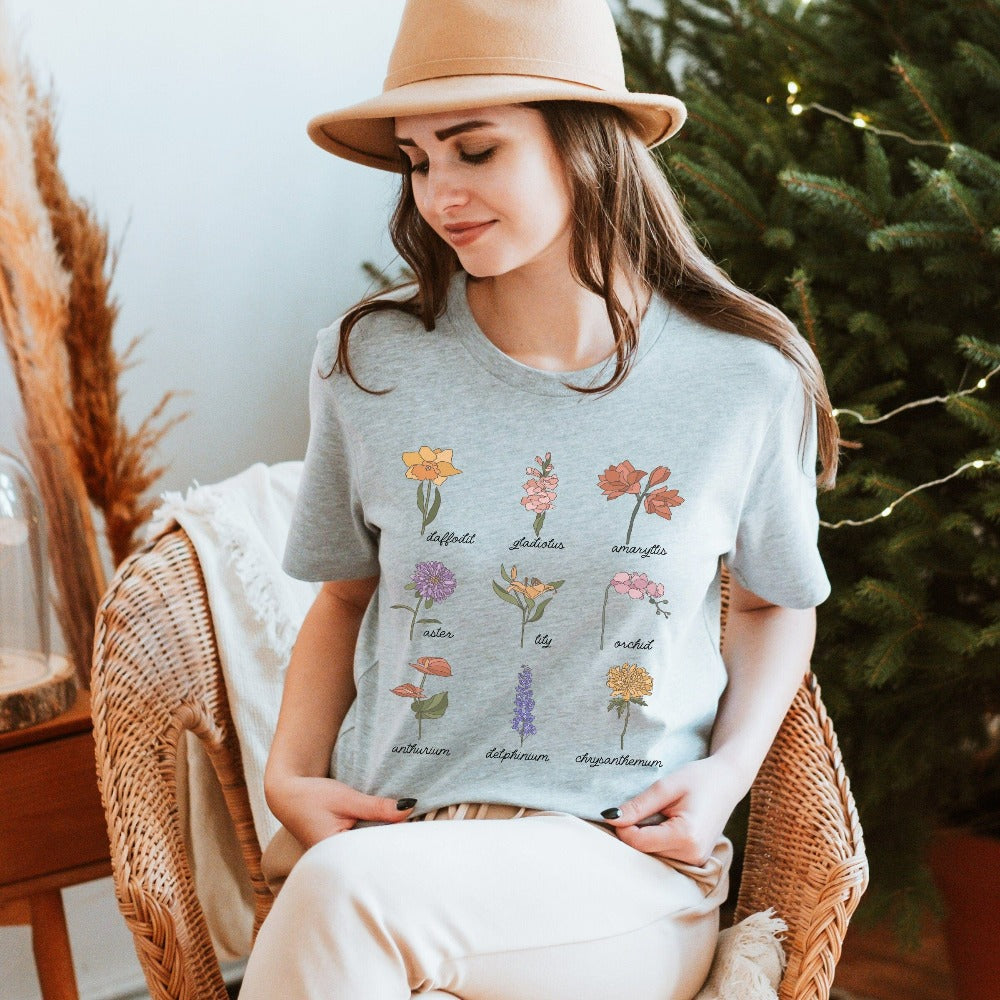Wildflower graphic shirt showing daffodil, gladiolus, amaryllis, aster, lily, orchid, anthurium, delphinium and chrysanthemum. This botanical wild flower casual tee is great for Mother's Day, birthday, Christmas holidays, gift for best friend, daughter, mom or loved one especially anyone that loves nature, flowers and adorable watercolor outfits.