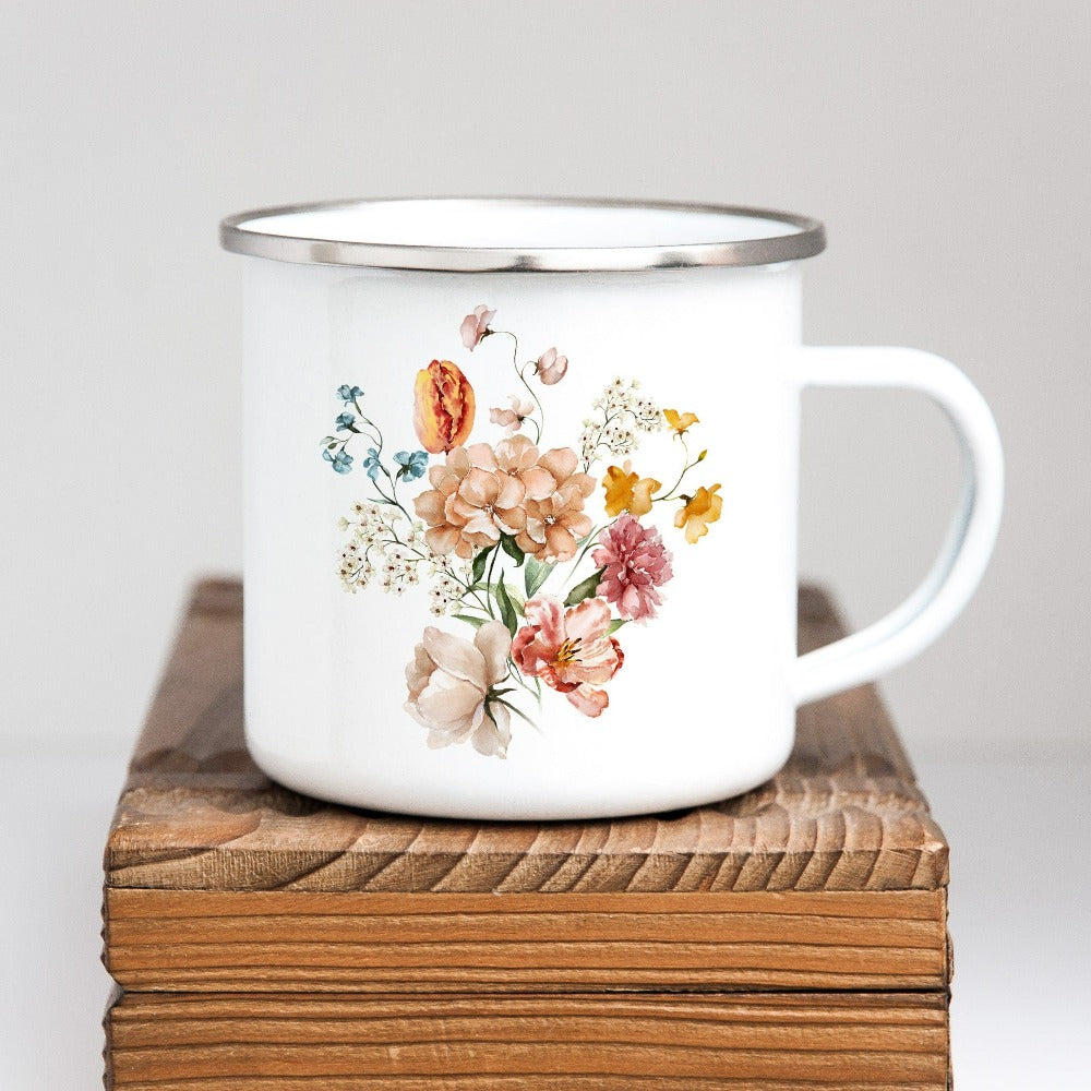 Bright, beautiful, simple and elegant. This adorable boho botanical floral coffee mug is a favorite. With wild flowers and cottage core vibes, it is perfect for any nature lover, plant lover or really anyone that appreciates the outdoors. The watercolor flower arrangement in pastel colors makes this graphic beverage cup unique and beautiful. Perfect gift idea for birthday, Christmas holiday, Mother's Day, Thanksgiving or anniversary.
