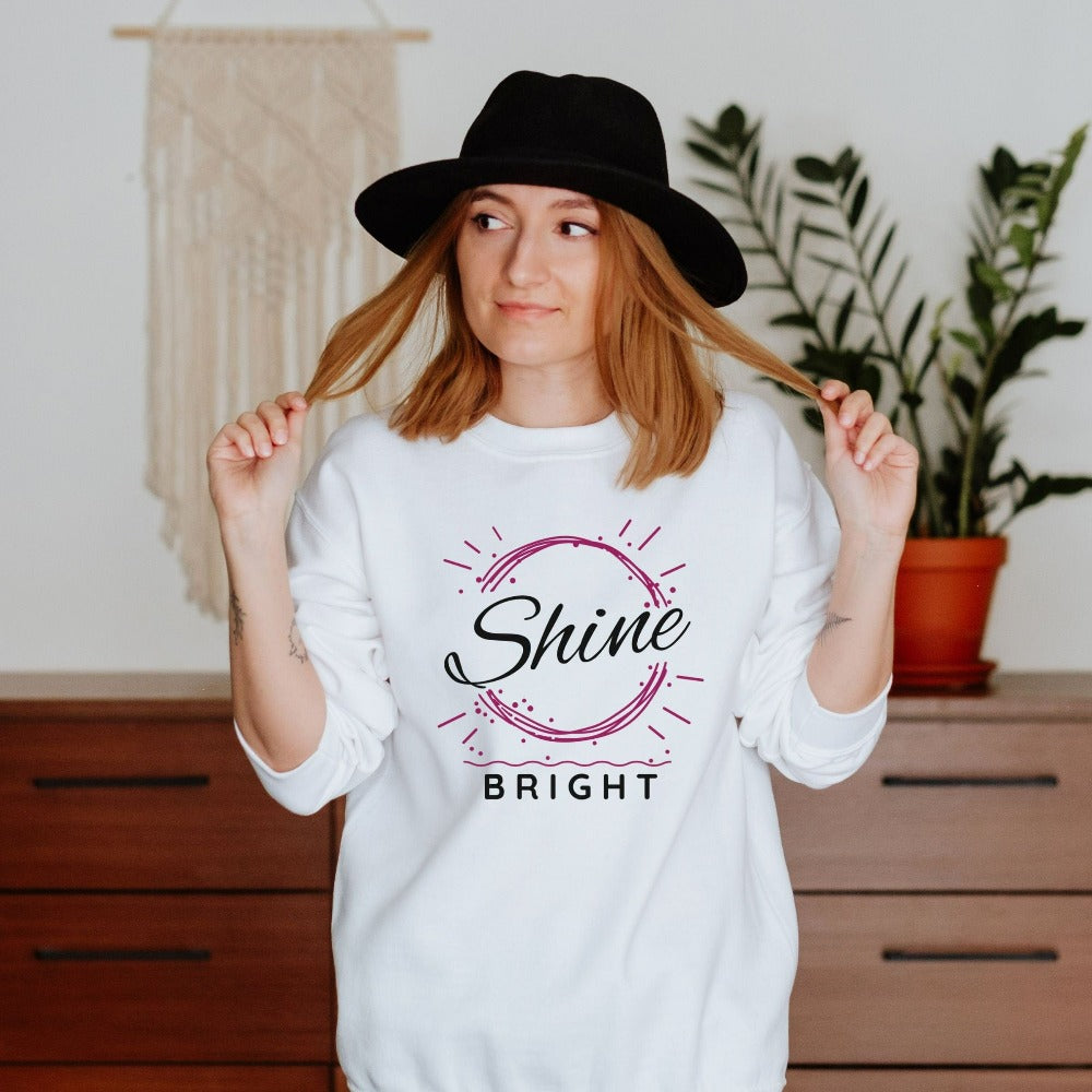 Shine Bright positive and motivational gift idea for friend, family, teacher, or co-worker. This sweatshirt is a perfect Christmas present, holiday outfit or birthday gift for a loved one. Inspirational saying graphic shirt.