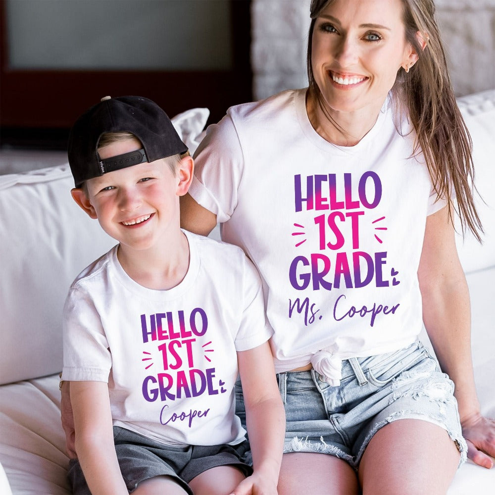 Hello 1st Grade! Customize this retro vibrant new grade shirt as a thank you gift idea for teacher, trainer, instructor and homeschool mama. Create a custom look and show appreciation to your favorite grade teacher with this unique shirt. Perfect for elementary team spirit, back to school, last day of school, summer or spring break. Great outfit for everyday use both in and out of the classroom.