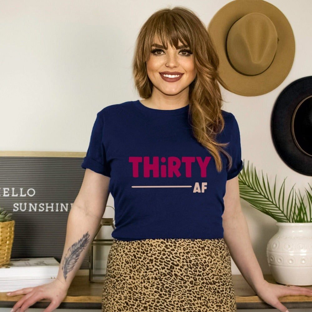 "Hello Thirty". Planning of a birthday celebration? Let's get this sassy thirty t-shirt as a female matching outfit on 30th birthday for yourself, mom, sister, daughter and bestfriend on any birthday celebration ideas like a party or road trip.   