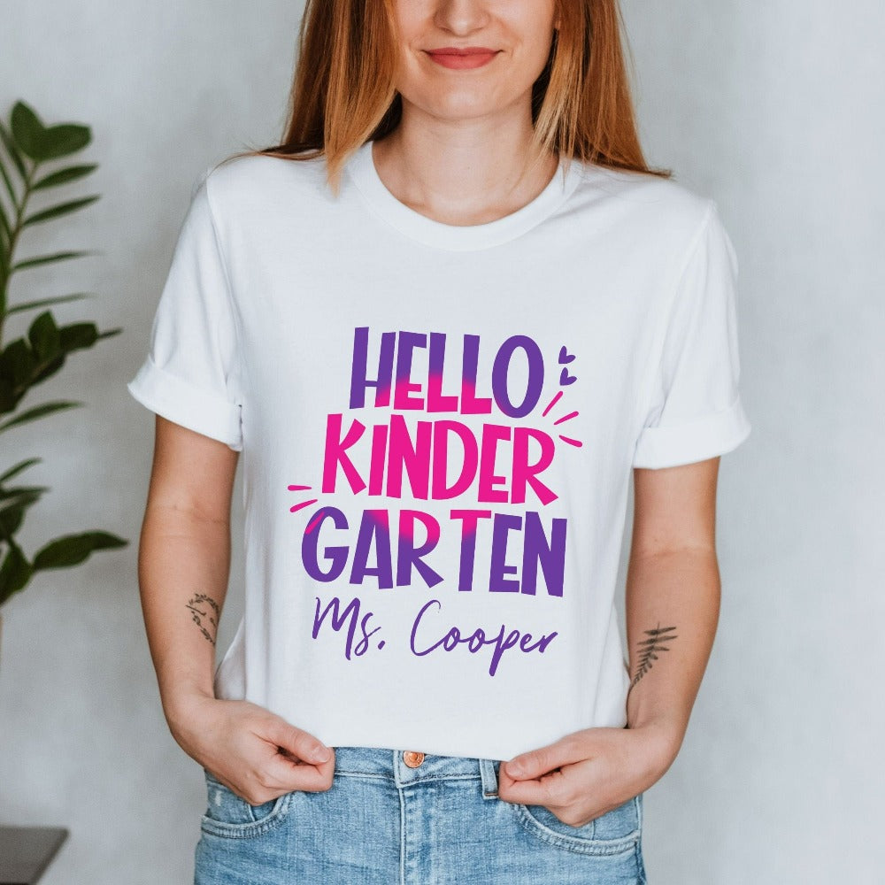 Hello Kindergarten! Customize this retro vibrant new grade shirt as a thank you gift idea for teacher, trainer, instructor and homeschool mama. Create a custom look and show appreciation to your favorite grade teacher with this unique shirt. Perfect for elementary team spirit, back to school, last day of school, summer or spring break. Great outfit for everyday use both in and out of the classroom.