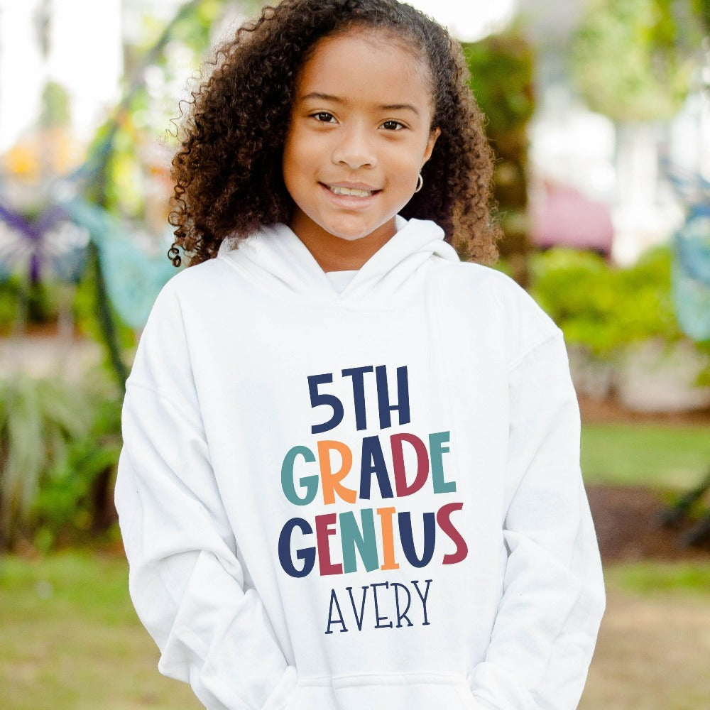 Customize this fifth grade, back to school sweatshirt gift idea for your genius. For first day of school, school field trips, 100 days of school, graduation or a new grade. Perfect name shirt outfit for everyday use in or out of classroom. 5th grade hoodie.