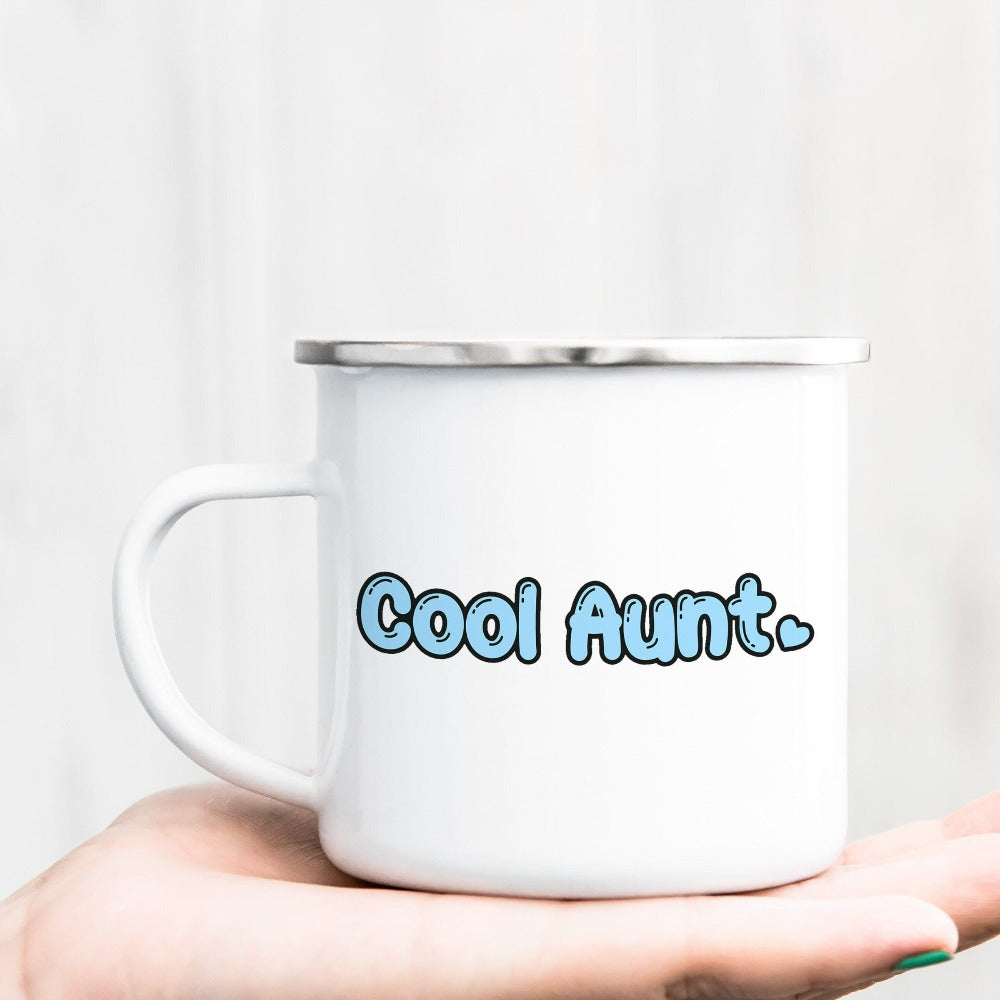 Show love and appreciation with this Cool Aunt coffee mug for the best auntie. Whether it's for a family reunion, weekend visit, birthday or Christmas holidays, this adorable top is a thoughtful gift idea for your aunt. Makes a great memorable present from niece or nephew on her special day. This cute uplifting present for aunty is a great idea for a pregnancy reveal or new baby announcement surprise to your sister, family, sibling or best friend as the newest favorite funtie tia!