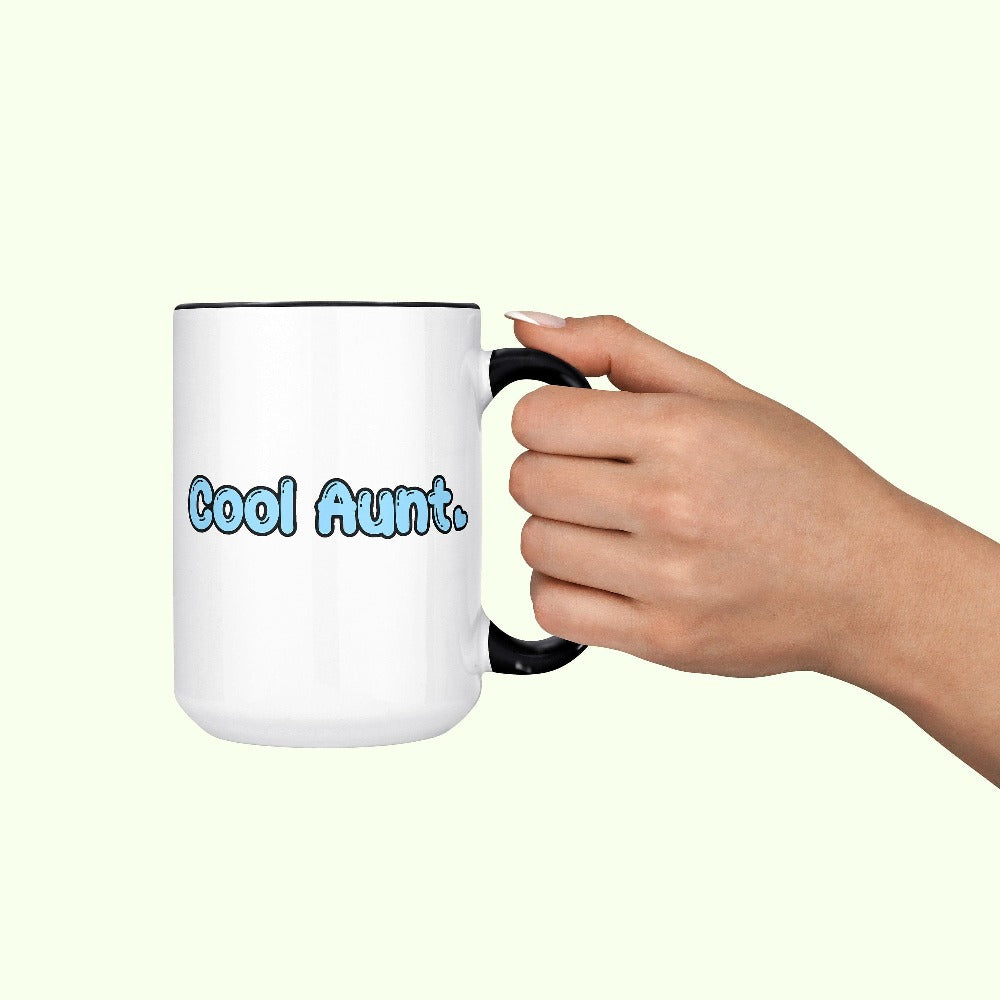 Show love and appreciation with this Cool Aunt coffee mug for the best auntie. Whether it's for a family reunion, weekend visit, birthday or Christmas holidays, this adorable top is a thoughtful gift idea for your aunt. Makes a great memorable present from niece or nephew on her special day. This cute uplifting present for aunty is a great idea for a pregnancy reveal or new baby announcement surprise to your sister, family, sibling or best friend as the newest favorite funtie tia!