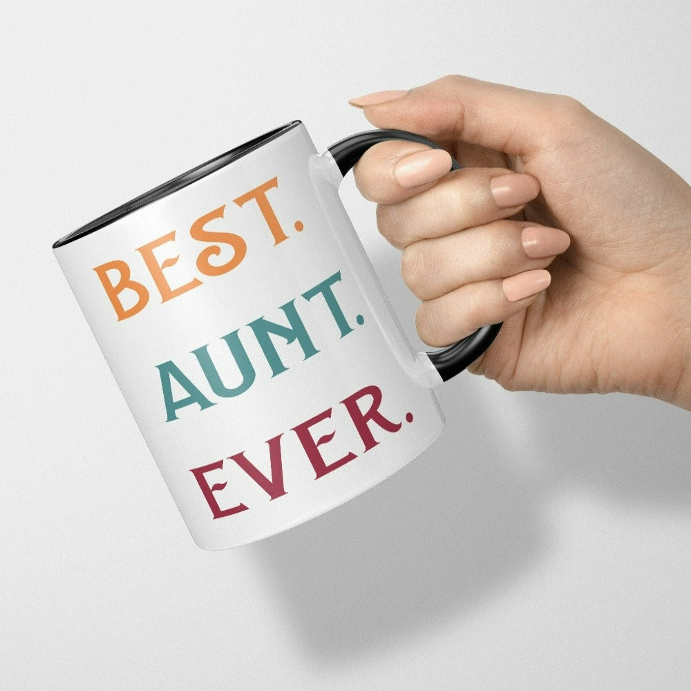 Celebrate the Best Aunt Ever with this colorful auntie coffee mug. Whether it's for a family reunion, weekend visit, birthday or Christmas holidays, this adorable beverage cup is a thoughtful gift idea for your aunt. Makes a great memorable present from niece or nephew on her special day. This cute souvenir for aunty is a great idea for a promoted to aunt pregnancy reveal or a new baby announcement surprise for your sister, family, sibling or best friend as the newest favorite funtie tia!