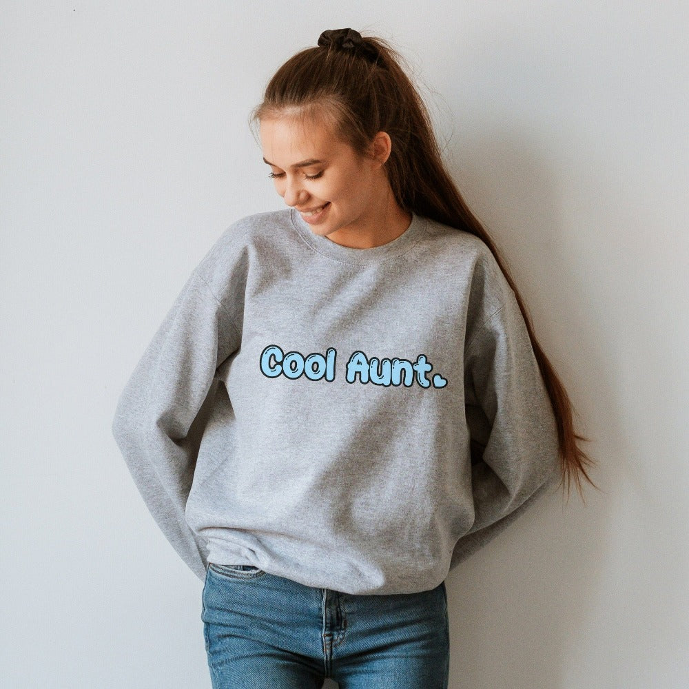 Show love and appreciation with this Cool Aunt sweatshirt for the best auntie. Whether it's for a family reunion, weekend visit, birthday or Christmas holidays, this adorable top is a thoughtful gift idea for your aunt. Makes a great memorable present from niece or nephew on her special day. This cute uplifting outfit for aunty is a great idea for a pregnancy reveal or new baby announcement surprise to your sister, family, sibling or best friend as the newest favorite funtie tia!