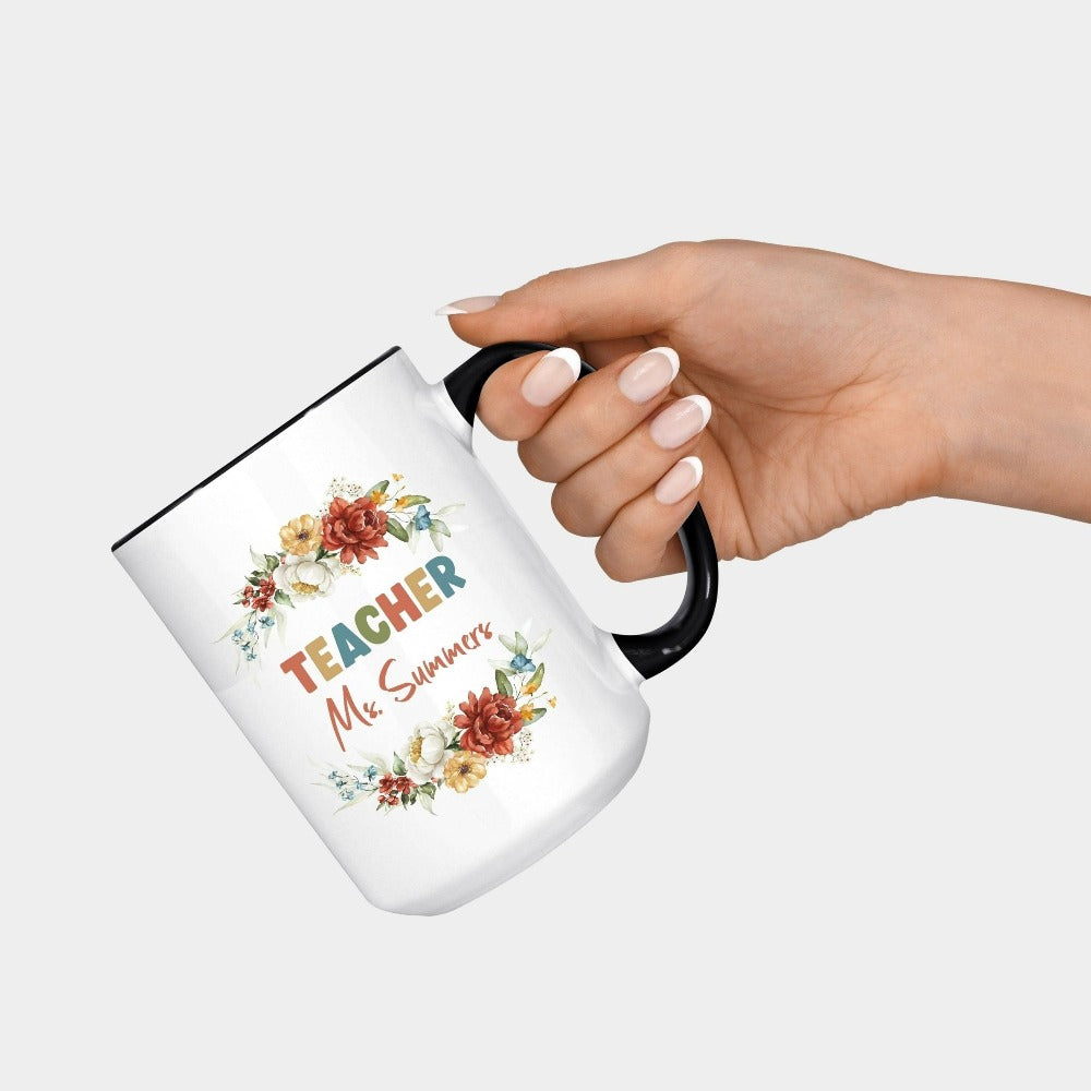 Customized floral botanical back to school teacher gift idea. This adorable coffee mug is for first day of school, last day, summer break or everyday appreciation present for your favorite kindergarten or grade teacher. Personalize with name with this positive beverage cup souvenir perfect for both classroom and field trip activities.
