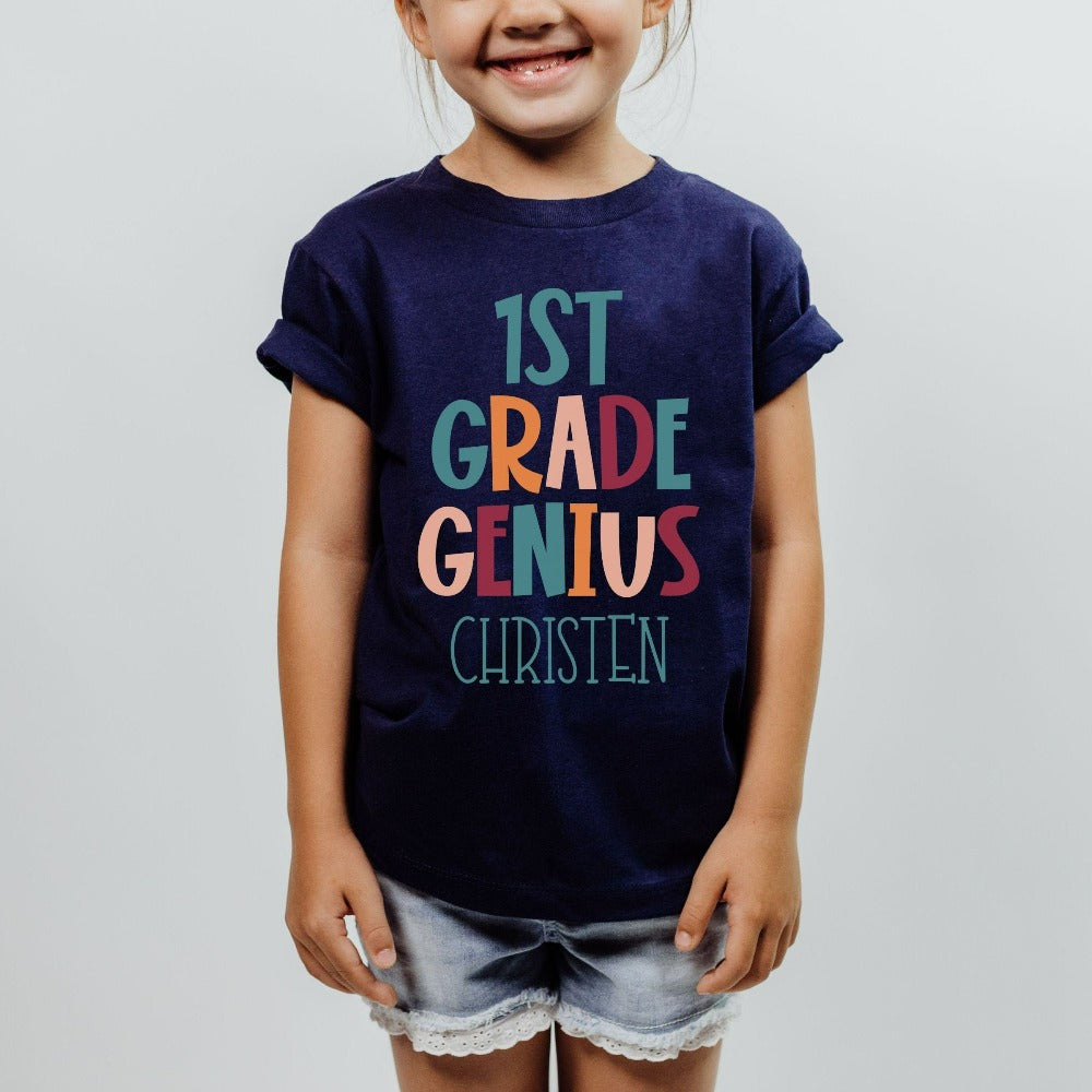 Customize this first grade, back to school shirt gift idea for your genius. For first day of school, school field trips, 100 days of school, graduation or a new grade. Perfect name tee outfit for everyday use in or out of classroom. 1st grade t-shirt.