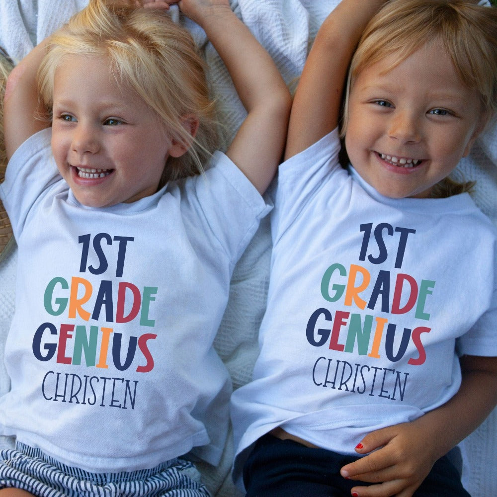 Customize this first grade, back to school shirt gift idea for your genius. For first day of school, school field trips, 100 days of school, graduation or a new grade. Perfect name tee outfit for everyday use in or out of classroom. 1st grade t-shirt.