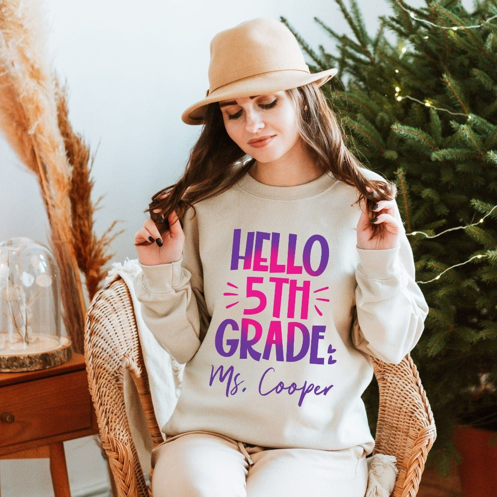 Hello 5th Grade! Customize this retro vibrant new grade sweatshirt as a thank you gift idea for teacher, trainer, instructor and homeschool mama. Create a custom look and show appreciation to your favorite grade teacher with this unique shirt. Perfect for elementary team spirit, back to school, last day of school, summer or spring break. Great outfit for everyday use both in and out of the classroom.
