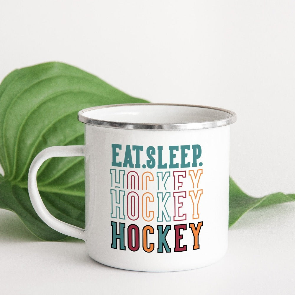 Eat, Sleep, Hockey coffee mug. It's always sports season depending on how you play. This playful hockey gift idea for your favorite athlete or hockey mom is bright and cheerful. Great for cheering on your team, getting ready for practice, heading out for a match and being the number one fan you have always been. Perfect hockey mom or dad birthday present.