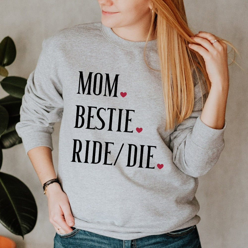 Mom Bestie sweatshirt. Celebrate mama and family with this shirt perfect for Mother's Day. This is a great baby announcement gift idea or baby shower present for the new mom. Also makes for a nice appreciative holiday gift from daughter or son.