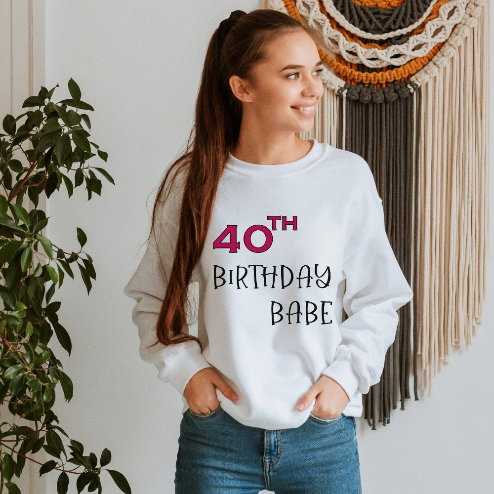 Say Hello 40 with this cute gift outfit for the 40th birthday babe. Celebrate the fabulous forty with your crew and stand out with a fun party sweatshirt. This is a great present for the 40 year old queen, sister, mom, daughter or best friend. It makes for a memorable new age celebration sweatshirt.