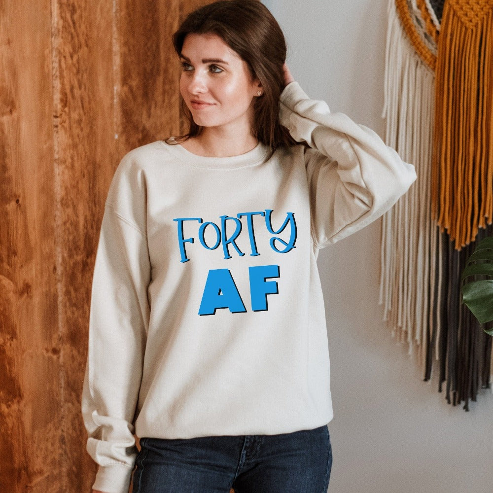 Say Hello to 40 with this fun birthday gift idea for yourself or a loved one. Perfect present for the 40th birthday girl, mom, daughter, son, babe, friend or co-worker. Soft cozy sweatshirt stands out with a vibrant look and makes this cute party shirt great for both indoor and outdoor wear.