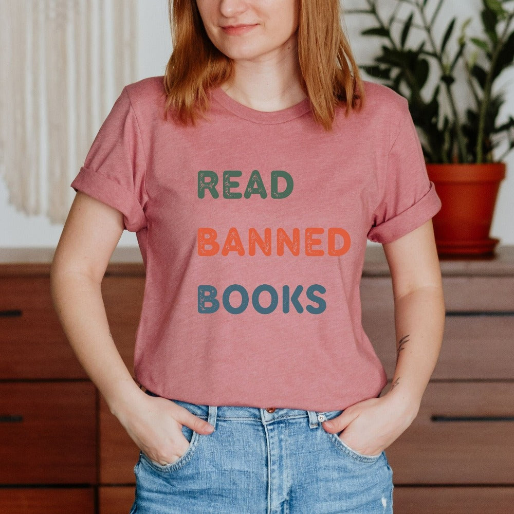 Funny book lover, English literature teacher, reading club or librarian gift idea. This Read Banned Books Humorous saying is a great expressive quote on a cozy shirt. It always becomes the center of great conversation and a favorite casual for writers.