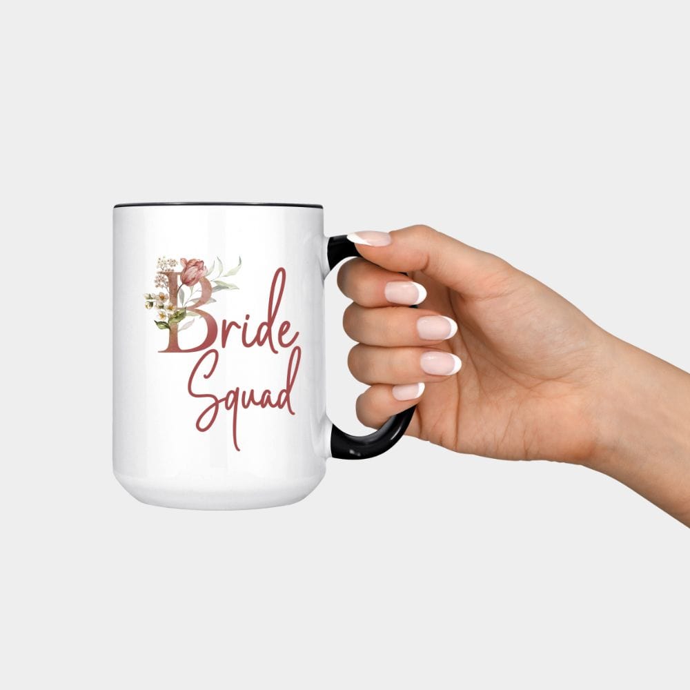 Floral bride squad coffee mug souvenir for maid of honor, bride team, bridesmaids, mother of the bride or groom and wedding party. Great idea for engagement announcement, bachelorette party, bridesmaid proposal box gift idea, rehearsal dinner, and after wedding parties. This cute getting ready present is a perfect addition for the bride's crew, team or squad.