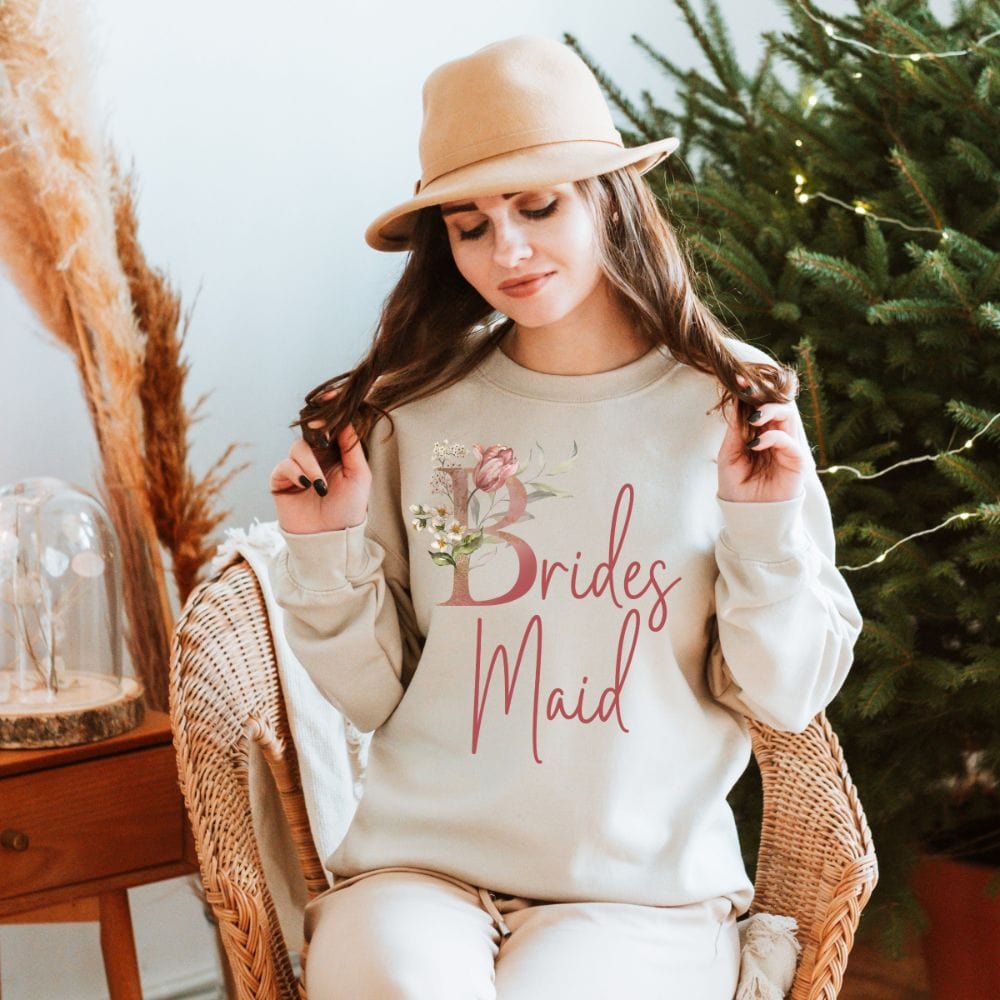 Floral bridal party sweatshirt for bridesmaid, BFF and bestie team on your wedding. Great idea for engagement announcement, bachelorette party, bridesmaid proposal box gift idea, rehearsal dinner, and after wedding parties. This cute getting ready outfit is a perfect addition for the bride's crew, team or squad.