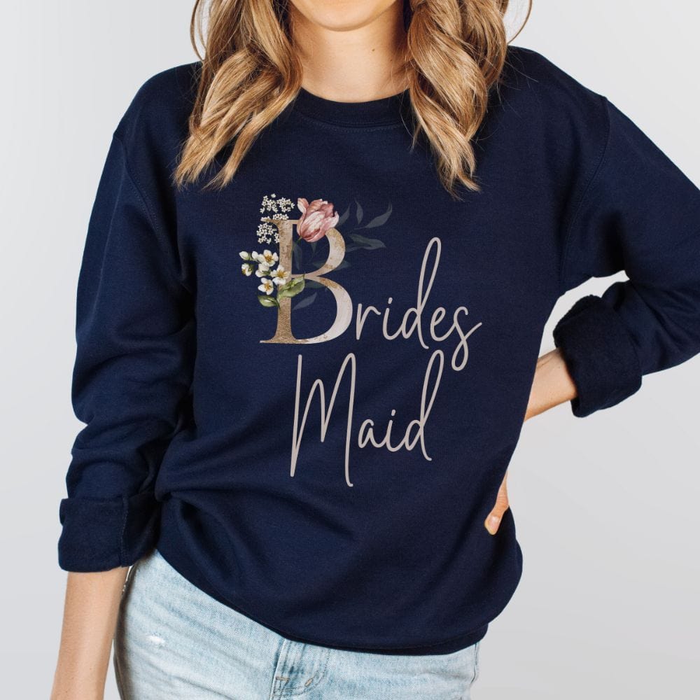 Floral bridal party sweatshirt for bridesmaid, BFF and bestie team on your wedding. Great idea for engagement announcement, bachelorette party, bridesmaid proposal box gift idea, rehearsal dinner, and after wedding parties. This cute getting ready outfit is a perfect addition for the bride's crew, team or squad.