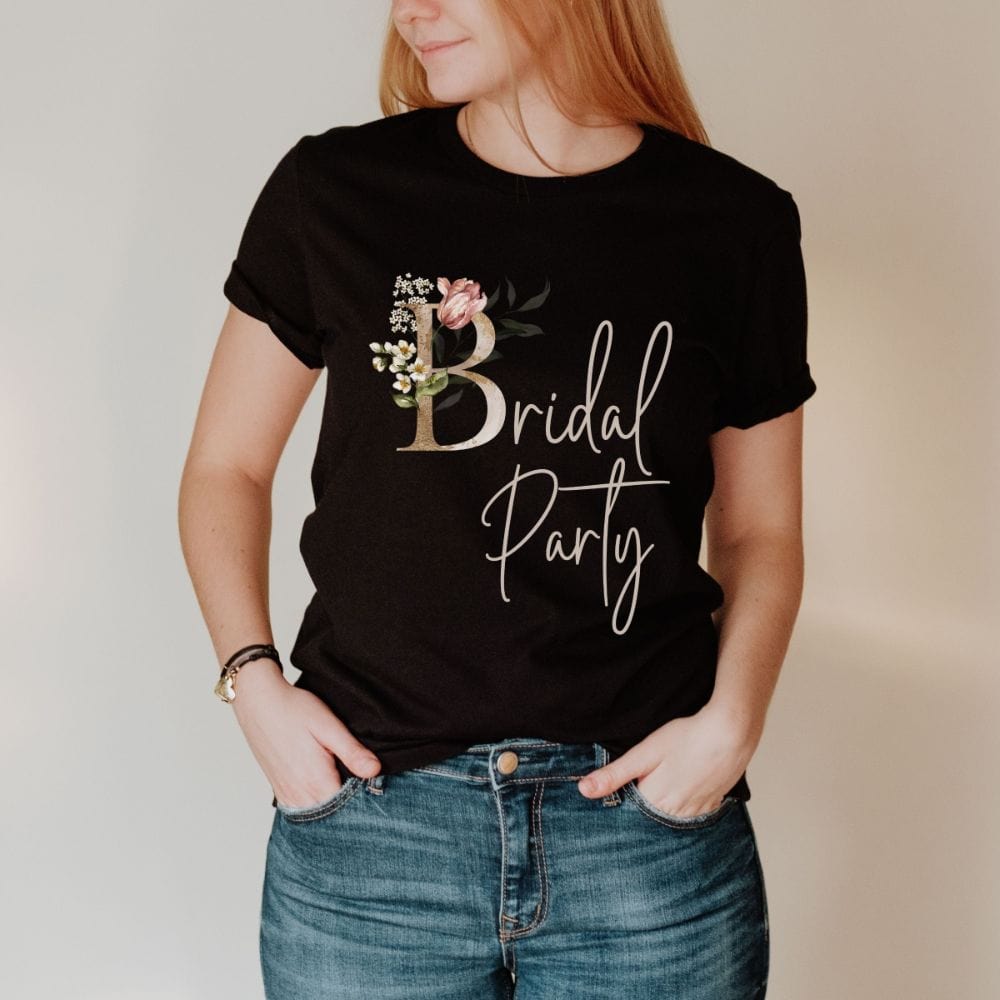 Floral bridal party shirt for maid of honor, bride team, bridesmaids, mother of the bride or groom and wedding party. Great idea for engagement announcement, bachelorette party, bridesmaid proposal box gift idea, rehearsal dinner, and after wedding parties. This cute getting ready casual tee is a perfect addition for the bride's crew, team or squad.