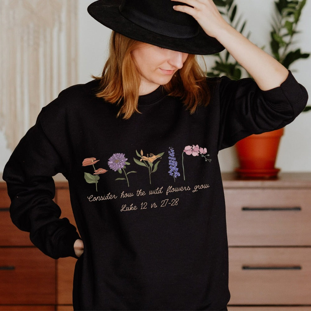Floral Christian wildflower sweatshirt. This bible verse quote from Luke 12: 27 - 28 is a supportive, uplifting and positive saying and makes this shirt a perfect gift idea for everyone. Perfect outfit for family reunion, friend's birthday, youth pastor, service leader, Sunday school camping, Mother's Day, Christmas holiday, Thanksgiving and more. The botanical wild flower design gives this religious apparel a relaxed cottage core boho look.