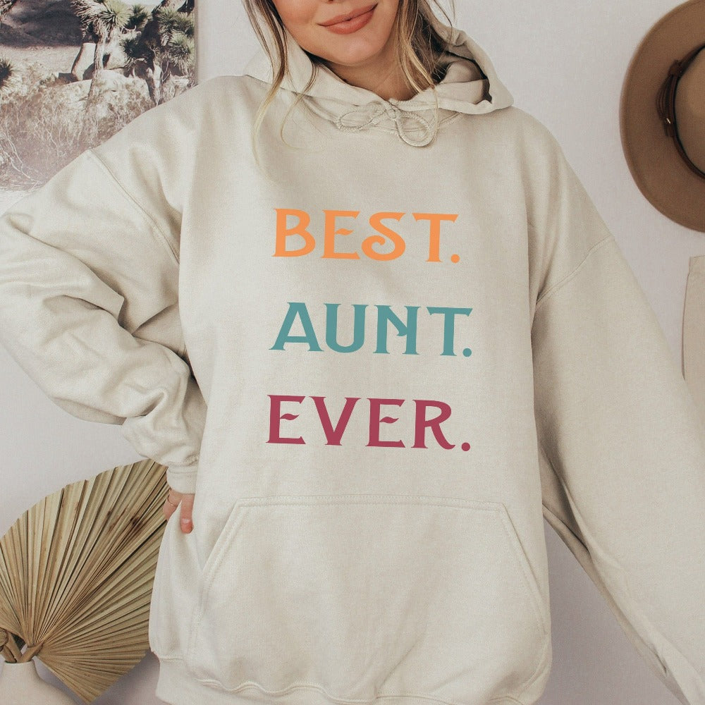 Celebrate the best Cool Aunt ever with this colorful auntie sweatshirt. Whether it's for a family reunion, weekend visit, birthday or Christmas holidays, this adorable top is a thoughtful gift idea for your aunt. Makes a great memorable present from niece or nephew on her special day. This cute uplifting outfit for aunty is a great idea for a promoted to aunt pregnancy reveal or new baby announcement surprise for your sister, family, sibling or best friend as the newest favorite funtie tia!