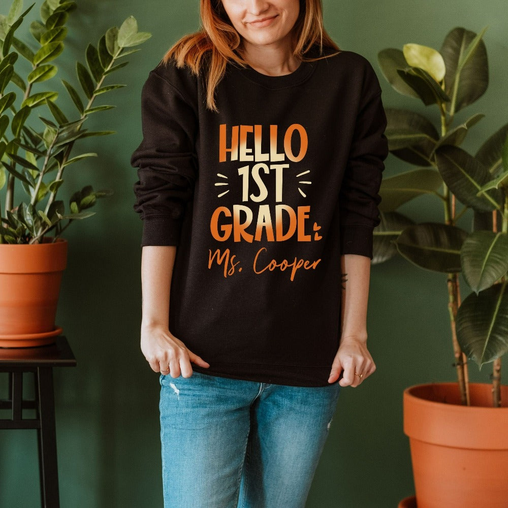 Hello 1st Grade! Customize this retro vibrant new grade sweatshirt as a thank you gift idea for teacher, trainer, instructor and homeschool mama. Create a custom look and show appreciation to your favorite grade teacher with this unique shirt. Perfect for elementary team spirit, back to school, last day of school, summer or spring break. Great outfit for everyday use both in and out of the classroom.