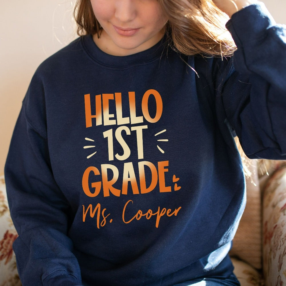 Hello 1st Grade! Customize this retro vibrant new grade sweatshirt as a thank you gift idea for teacher, trainer, instructor and homeschool mama. Create a custom look and show appreciation to your favorite grade teacher with this unique shirt. Perfect for elementary team spirit, back to school, last day of school, summer or spring break. Great outfit for everyday use both in and out of the classroom.