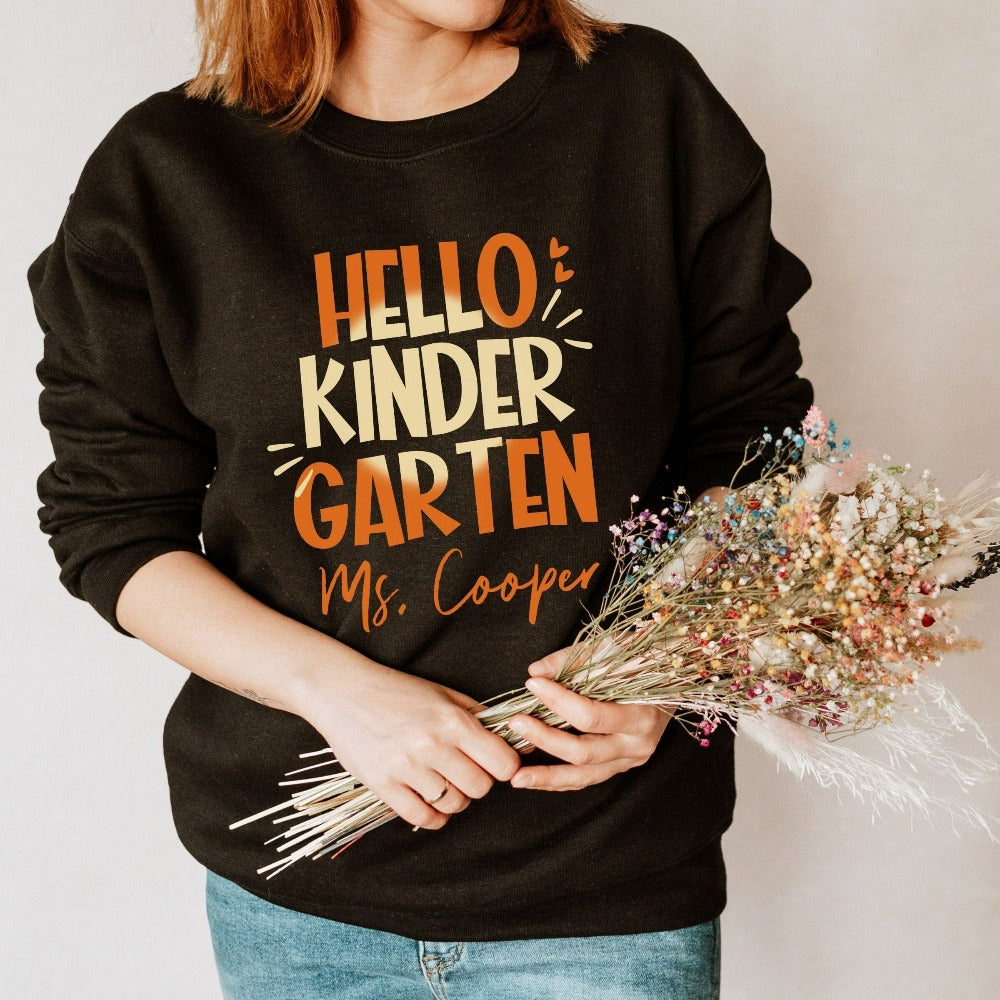 Hello Kindergarten! Customize this retro vibrant new grade sweatshirt as a thank you gift idea for teacher, trainer, instructor and homeschool mama. Create a custom look and show appreciation to your favorite grade teacher with this unique shirt. Perfect for elementary team spirit, back to school, last day of school, summer or spring break. Great outfit for everyday use both in and out of the classroom.