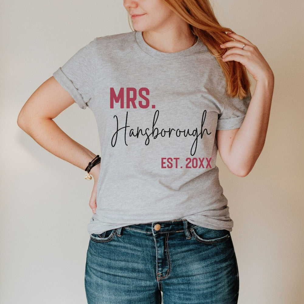 Grab this adorable Mrs. shirt for the newest bride to be. Customized with name and date, this cute gift idea is perfect for a bridal shower or wedding present for the soon to be Mrs or engagement anniversary gift for wife/spouse. Custom personalized bachelorette shirt outfit.