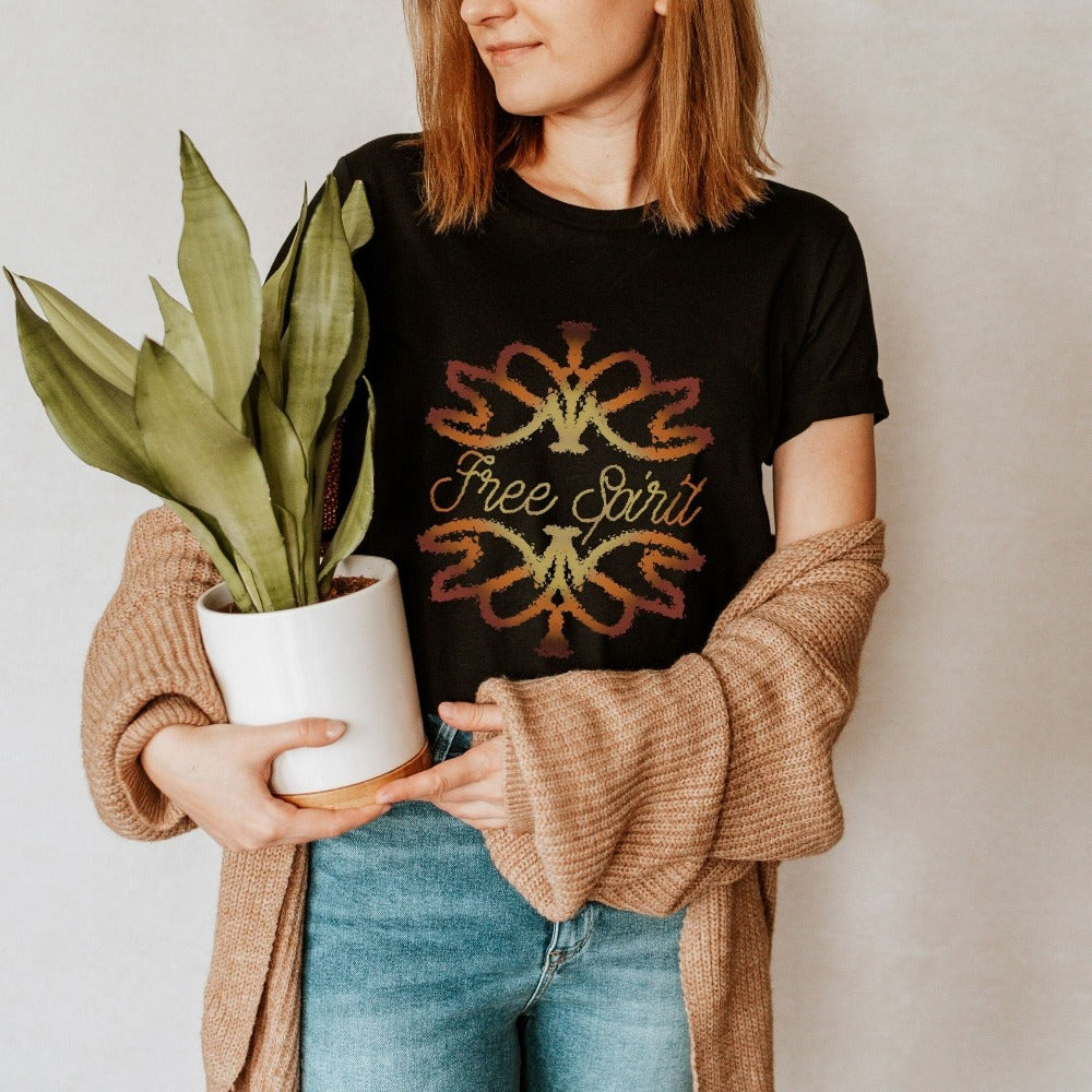 Free spirit graphic shirt. This boho abstract design outfit is perfect for everyday use both indoors and outdoors. With vintage bohemian vibes, this is a great birthday or Christmas holiday present for a loved wildflower you know. Great gift idea for nature lover, spirituality aware friend, yogi and outdoorsy friend.