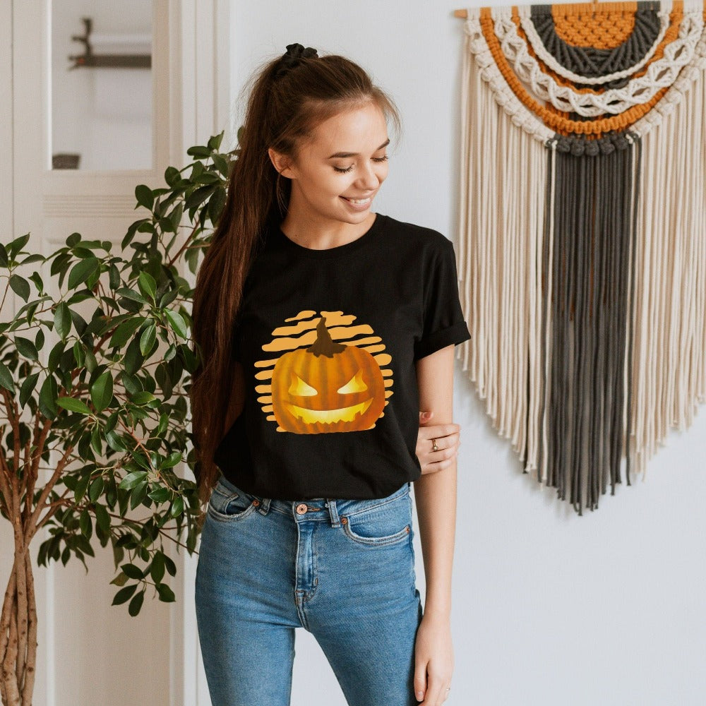 Halloween Jack-o-lantern shirt. Get ready for spooky season with this adorable cheerful t-shirt. Perfect autumn and pumpkin season outfit for fall months.