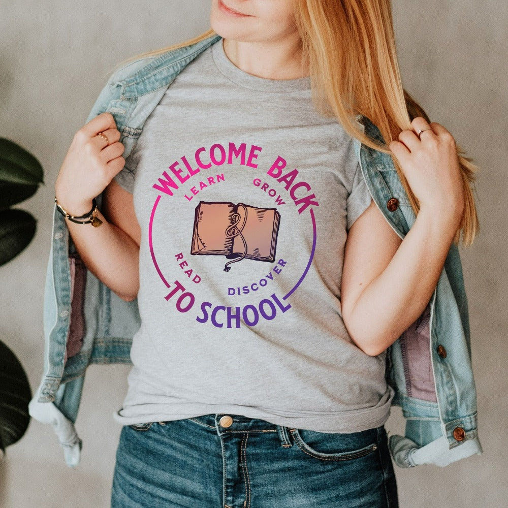 First day welcome back to school new grade teacher t-shirt. This cute and unique shirt is great for school start, and makes a great gift idea for your favorite elementary, middle or high school teacher. Grab this for your staff teacher school crew as a matching shirt.