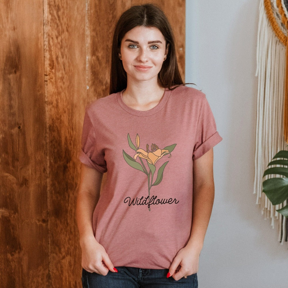 This minimalist wildflower graphic lily shirt is elegant and perfect gift idea for mom, daughter, teenager, sister, best friend especially if they love lilies, the outdoors, nature, plants or flowers. The floral boho cottage core look is great for every occasion and works as a birthday, Christmas holiday, Mother's Day, anniversary or Thanksgiving gift idea.