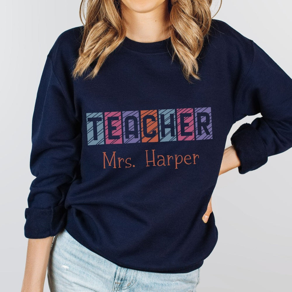 Custom name sweatshirt gift idea for teacher, trainer, instructor and homeschool mama. Show appreciation to your favorite grade teacher with this vibrant trendy shirt. Perfect for elementary, middle or high school, back to school, last day of school, summer or spring break. Great for everyday use both in and out of the classroom.