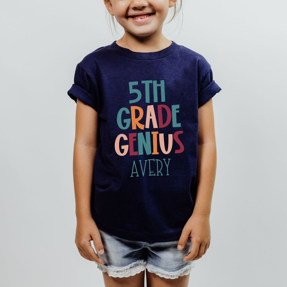 Customize this fifth grade, back to school shirt gift idea for your genius. For first day of school, school field trips, 100 days of school, graduation or a new grade. Perfect name tee outfit for everyday use in or out of classroom. 5th grade t-shirt.
