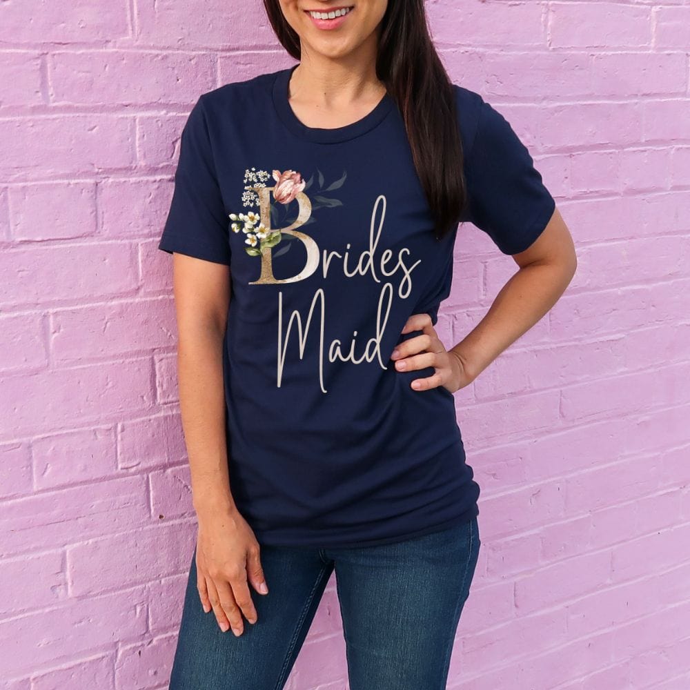 Floral bridal party shirt for bridesmaid, BFF and bestie team on your wedding. Great idea for engagement announcement, bachelorette party, bridesmaid proposal box gift idea, rehearsal dinner, and after wedding parties. This cute getting ready casual tee is a perfect addition for the bride's crew, team or squad.