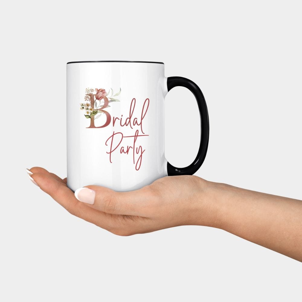 Floral bridal party coffee mug souvenir for maid of honor, bride team, bridesmaids, mother of the bride or groom and wedding party. Great idea for engagement announcement, bachelorette party, bridesmaid proposal box gift idea, rehearsal dinner, and after wedding parties. This cute getting ready present is a perfect addition for the bride's crew, team or squad.