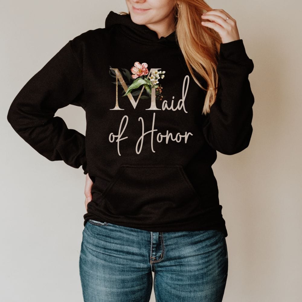 Floral maid of honor wedding party hoodie for matron of honor. Great idea for engagement announcement, bachelorette party, bridesmaid proposal box gift idea, rehearsal dinner, and after wedding parties. This cute getting ready present is a perfect addition for the bride's crew, team or squad.
