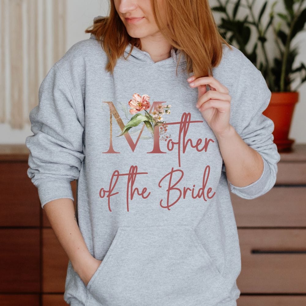 Floral mother of the bride wedding party sweatshirt for mom. Great idea for engagement announcement, rehearsal dinner, and after wedding parties. This cute getting ready apparel is a perfect addition to the bride's crew, team or squad.