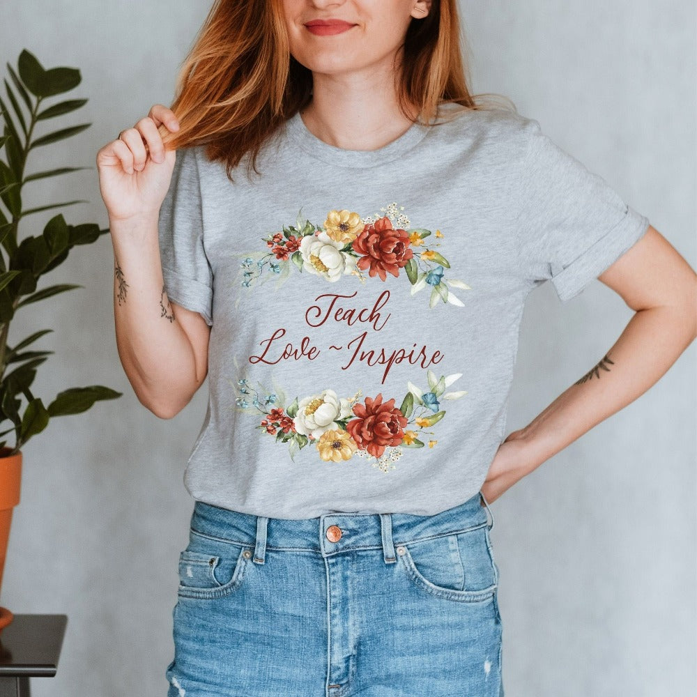 Floral botanical back to school teacher gift idea. This adorable shirt is for first day of school, last day, summer break or everyday appreciation present for your favorite kindergarten or grade teacher. Teach, Love, Inspire, Learn and Motivate in this positive outfit perfect for both classroom and field trip activities.