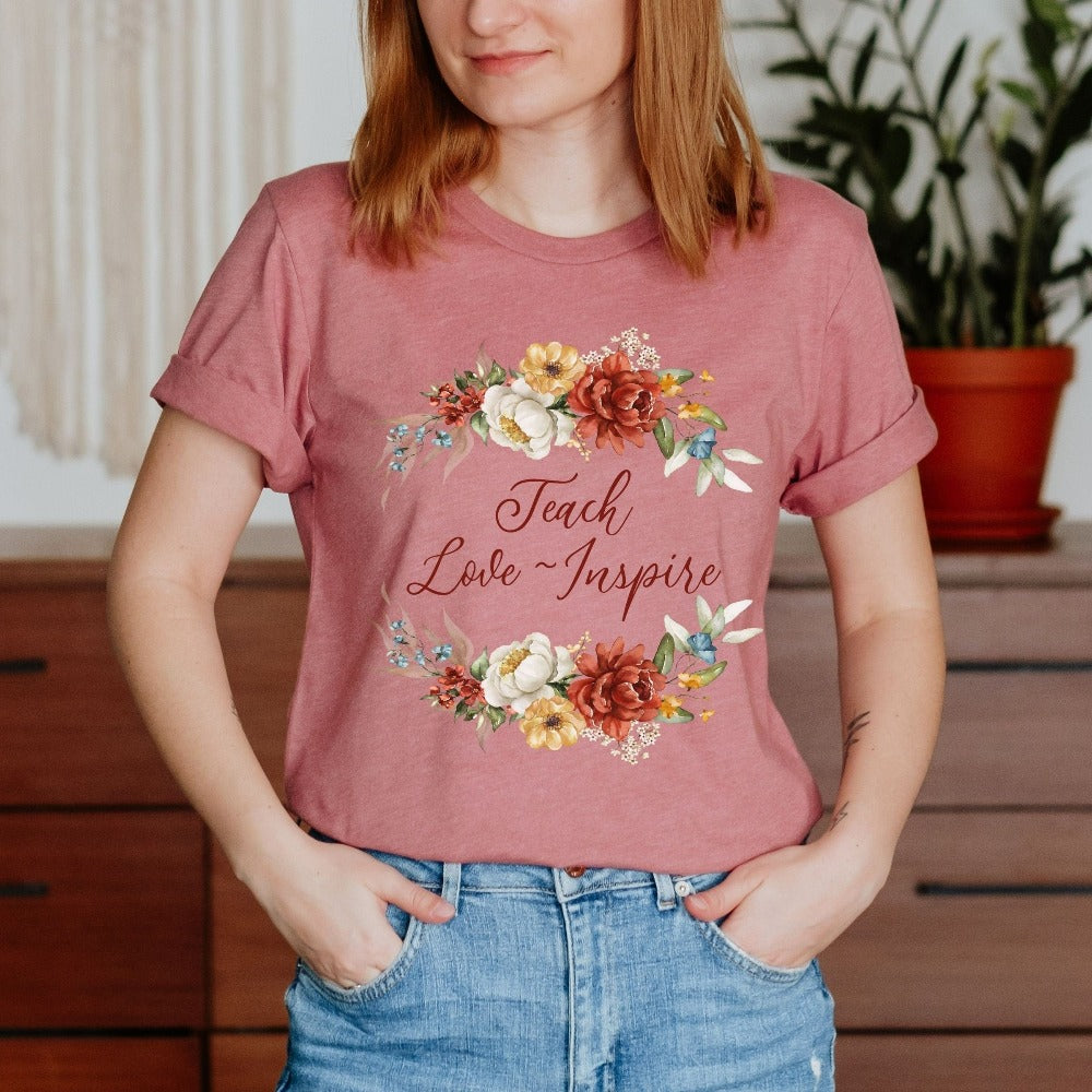 Floral botanical back to school teacher gift idea. This adorable shirt is for first day of school, last day, summer break or everyday appreciation present for your favorite kindergarten or grade teacher. Teach, Love, Inspire, Learn and Motivate in this positive outfit perfect for both classroom and field trip activities.