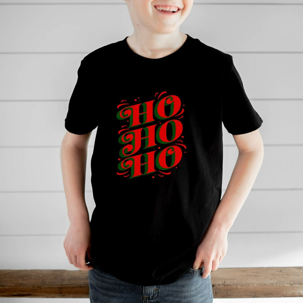 Jolly, merry and bright Ho Ho Ho Christmas shirt. Great matching family reunion lounge set for the holidays. Celebrate the Xmas spirit, snow days, sweater weather, lights and great friendship with this adorable festive outfit. Perfect gift idea fit for home visits, office end of year party, secret Santa, family stocking stuffers, teacher gifts and Christmas season presents.