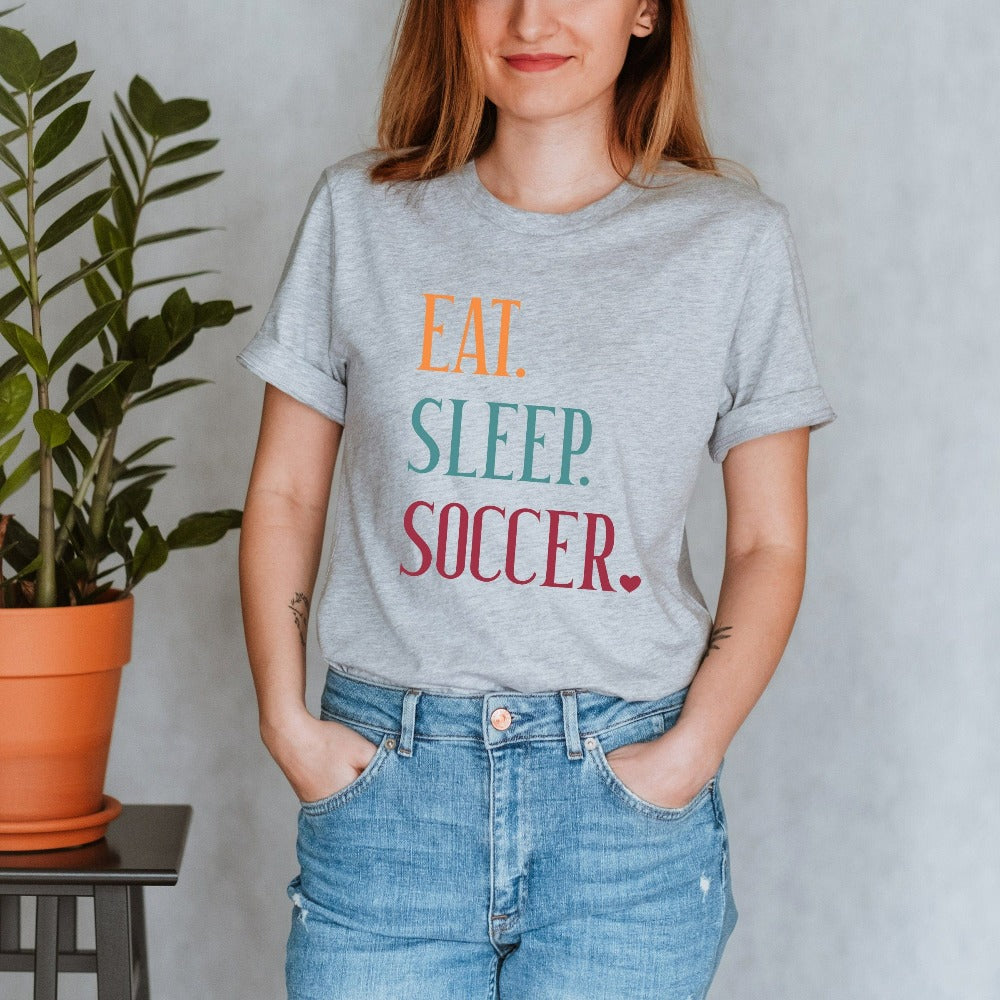 Eat, Sleep, Soccer casual shirt. It's always sports season depending on how you play. This playful soccer gift idea for your favorite athlete or soccer mom is bright and cheerful. Great for cheering on your team, getting ready for practice, heading out for a match and being the number one fan you have always been. Perfect soccer mom or dad outfit.