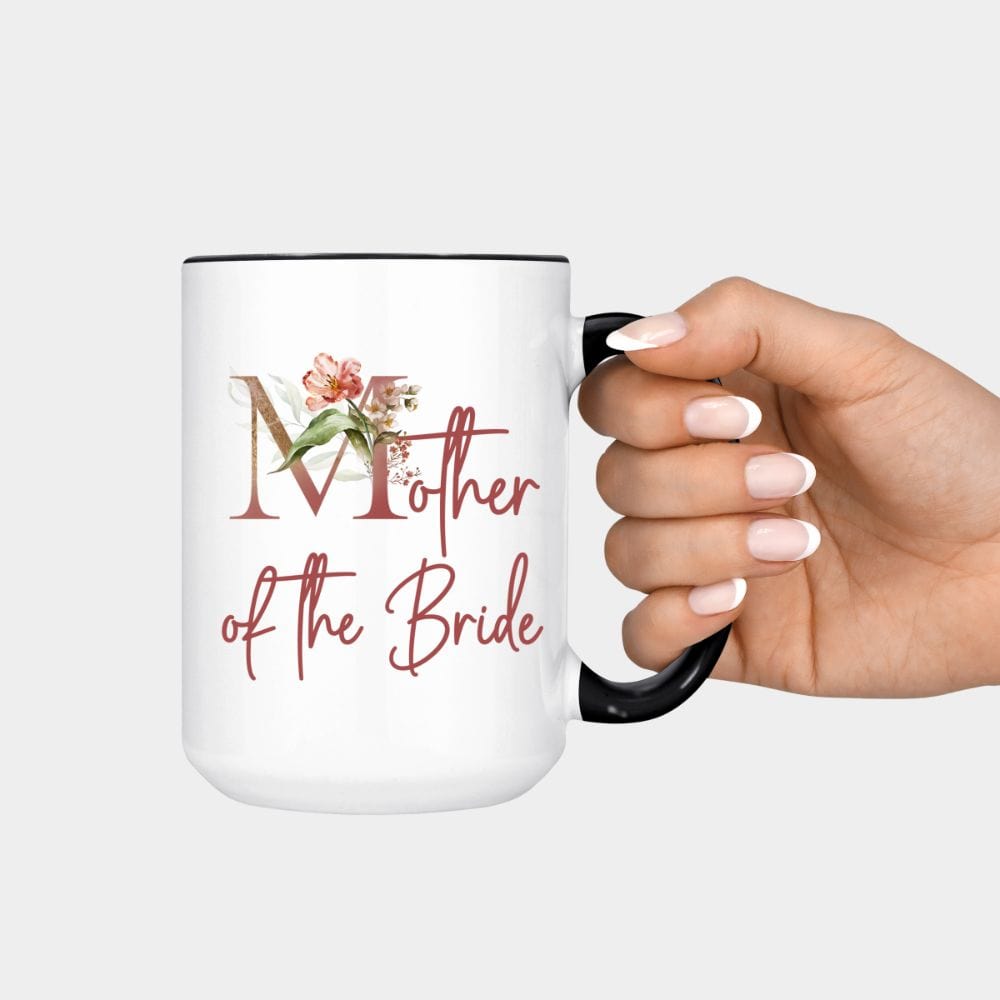 Floral mother of the bride wedding party coffee mug souvenir for mom. Great idea for engagement announcement, rehearsal dinner, and after wedding parties. This cute getting ready apparel is a perfect addition to the bride's crew, team or squad.