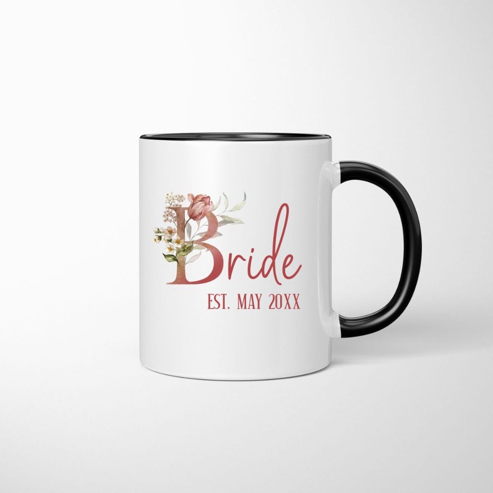 Customizable floral bride coffee mug souvenir for fiancée, wife, spouse, BFF or bestie on your wedding or anniversary. Great idea for engagement announcement, bachelorette party, bridesmaid gift idea, rehearsal dinner tea cup, and after wedding party gift. This cute getting ready present is a perfect idea for soon-to-be daughter-in-law, future Mrs. bride or as a honeymoon vacation souvenir. Personalize with date for a special touch.